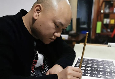 覃宇达